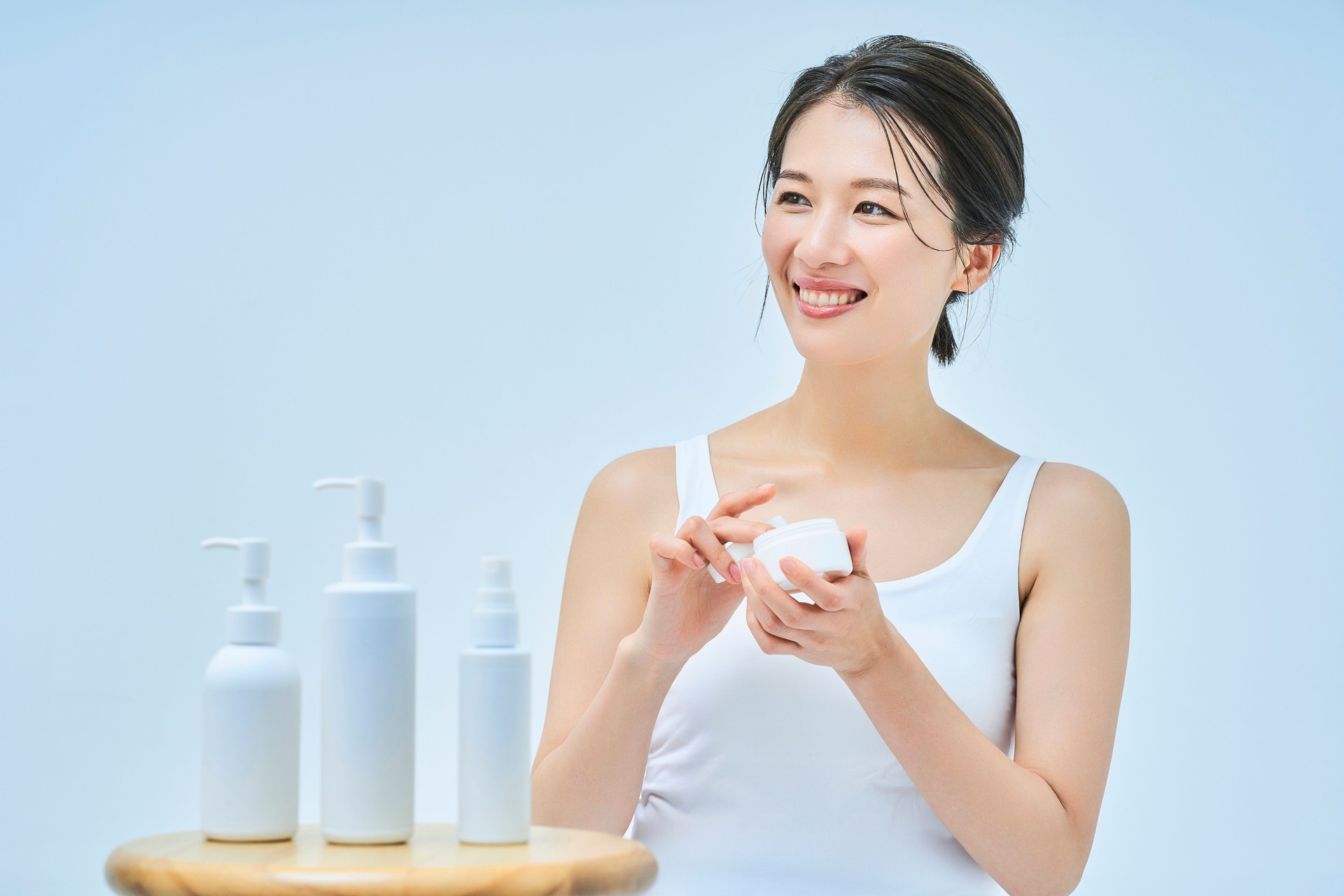 asian woman doing skin care